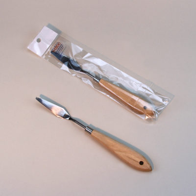 Diamond Spreader Knife shown in the protective packaging