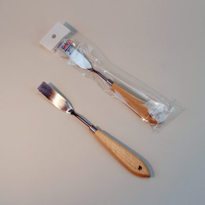 Rectangular Spreader Knife shown in the protective packaging